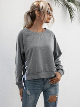 Load image into Gallery viewer, Lace-Up Round Neck Long Sleeve Sweatshirt